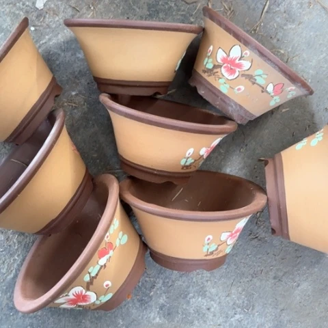 紫砂花盆100-8。  20-10