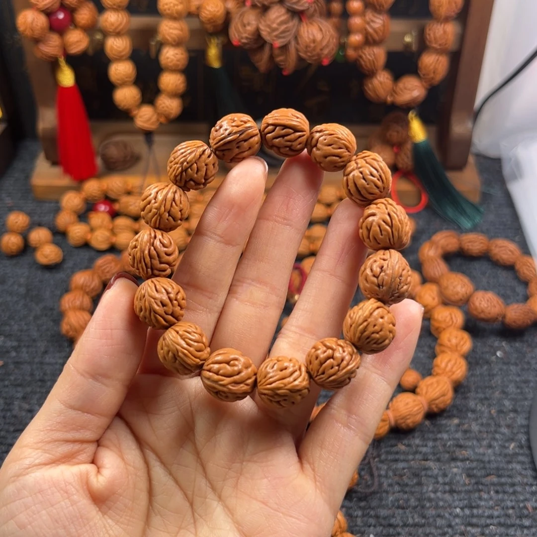 楛***糖桃核吊坠桃枭手串L2