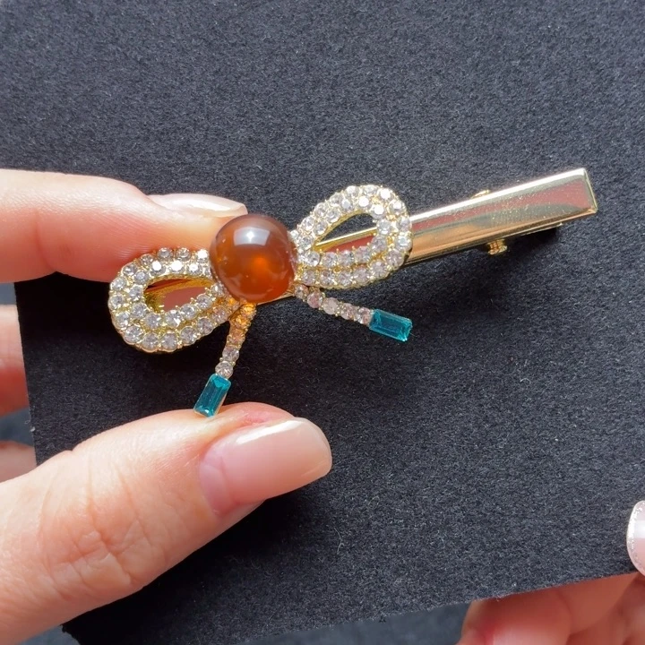 琥珀未镶嵌珠宝奇石10.3mm橘红蜜蝴蝶结鸭嘴夹