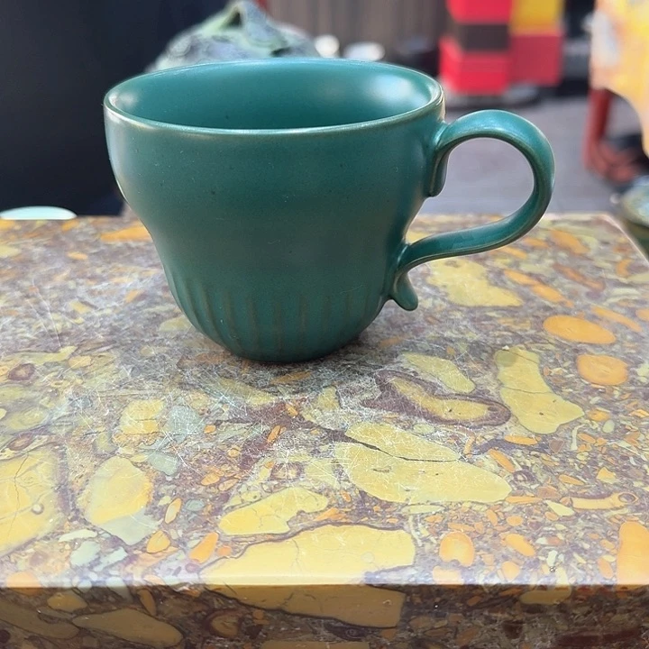 咖啡杯一个。。。品茗