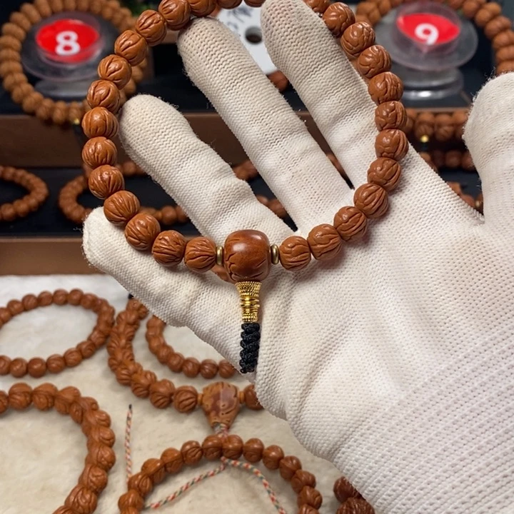 桃核吊坠铭****n秦岭龙纹