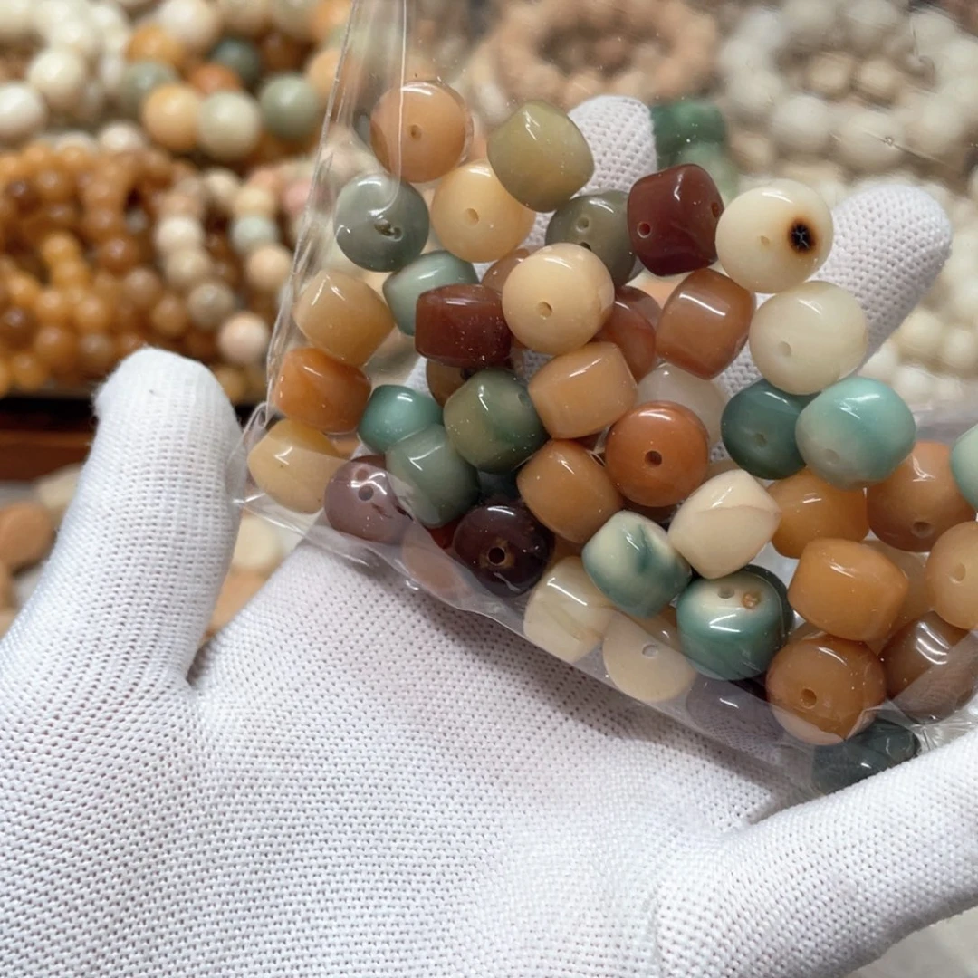 菩提根/象牙果吊坠瑕疵水磨金轮50颗0015