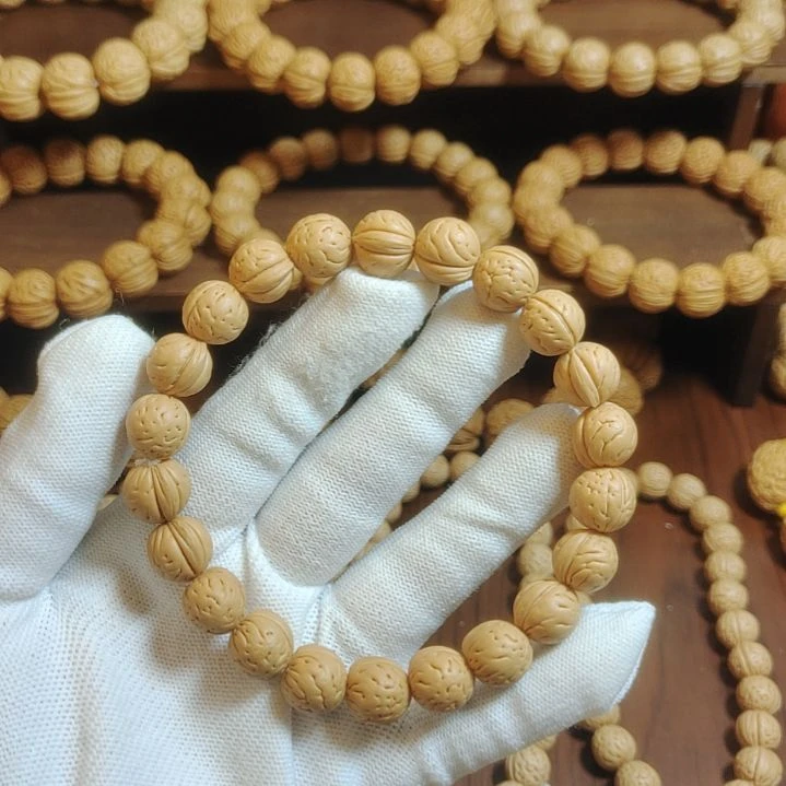 桃核吊坠一道筋手串