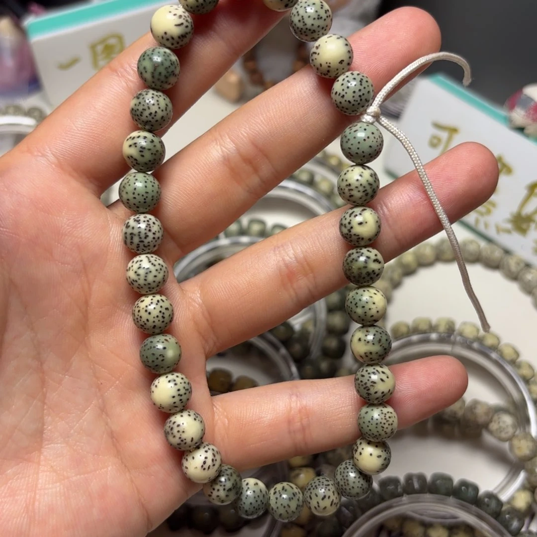 卡9手持圆珠石玉料