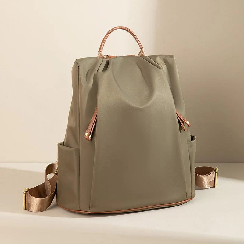 米琦袋鼠防盗轻便双肩包2025新款时尚大容量牛津布女士旅游背包