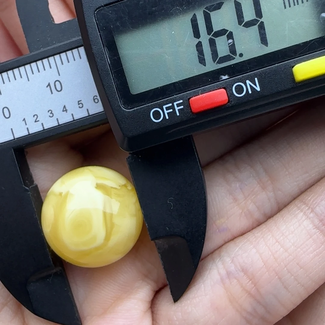 (***良蜜蜡未镶嵌裸石微瑕飘花圆珠