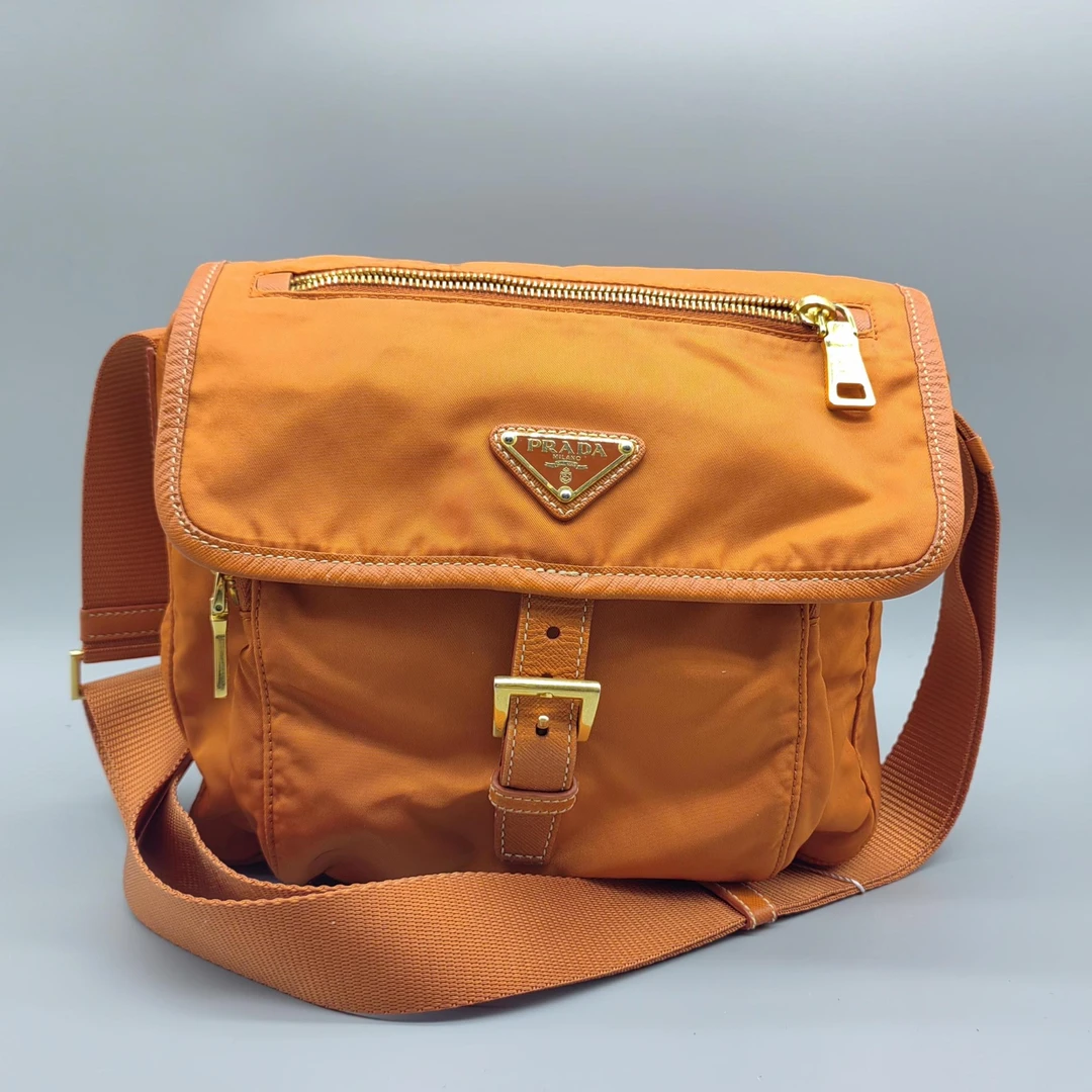 95新 Prada/普拉达  橙色斜挎包  1662 4155