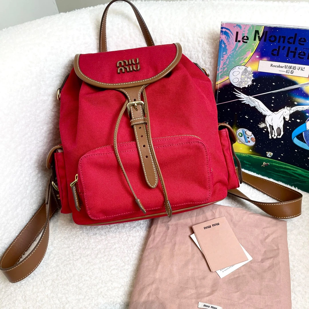 99新 MIU MIU/缪缪 帆布拼皮双肩包/69242745/12期免息/代卖服务