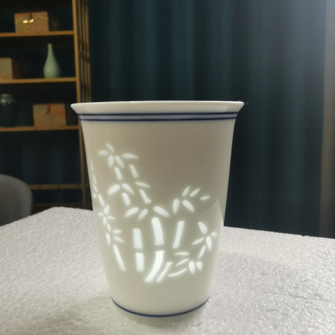 景德镇陶瓷釉下彩青花玲珑瓷梅兰竹菊主人杯玲珑杯