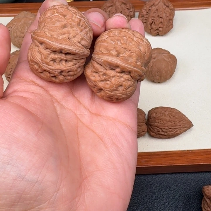 阳***。文玩核桃把件全品元宝40