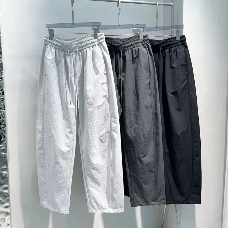 速干透气简约纯色弯刀裤香蕉休闲裤男士抗皱时尚百搭宽松直筒长裤