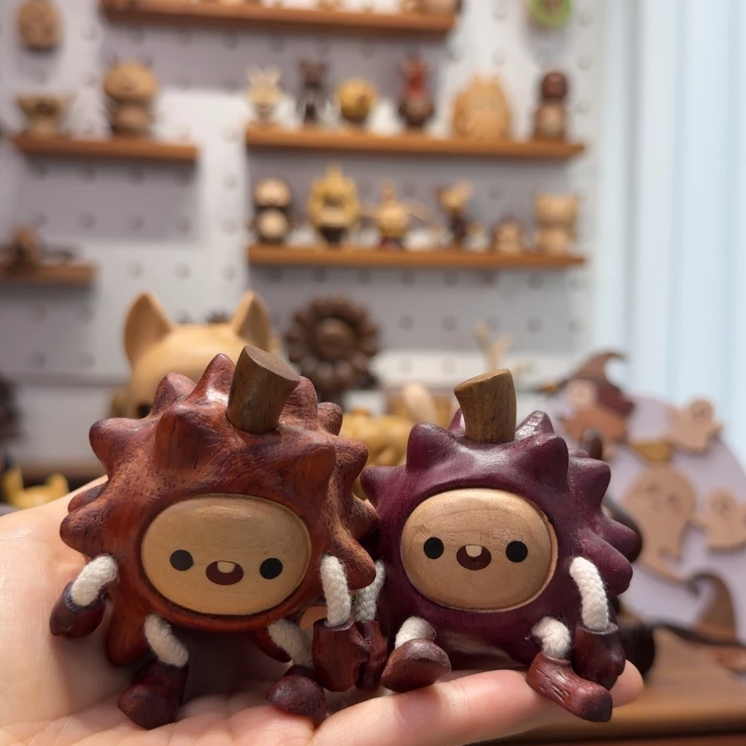 木一对榴莲人摆件