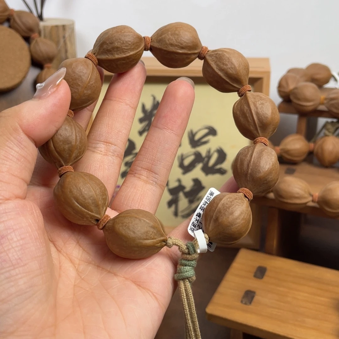 鑫***司手串/手链橄榄核21*26梅林铁核