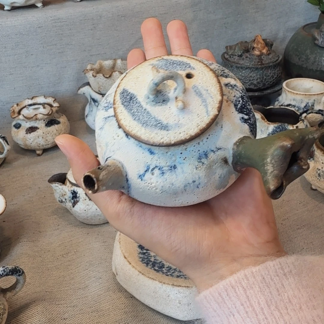 微瑕手抓壶一只一只