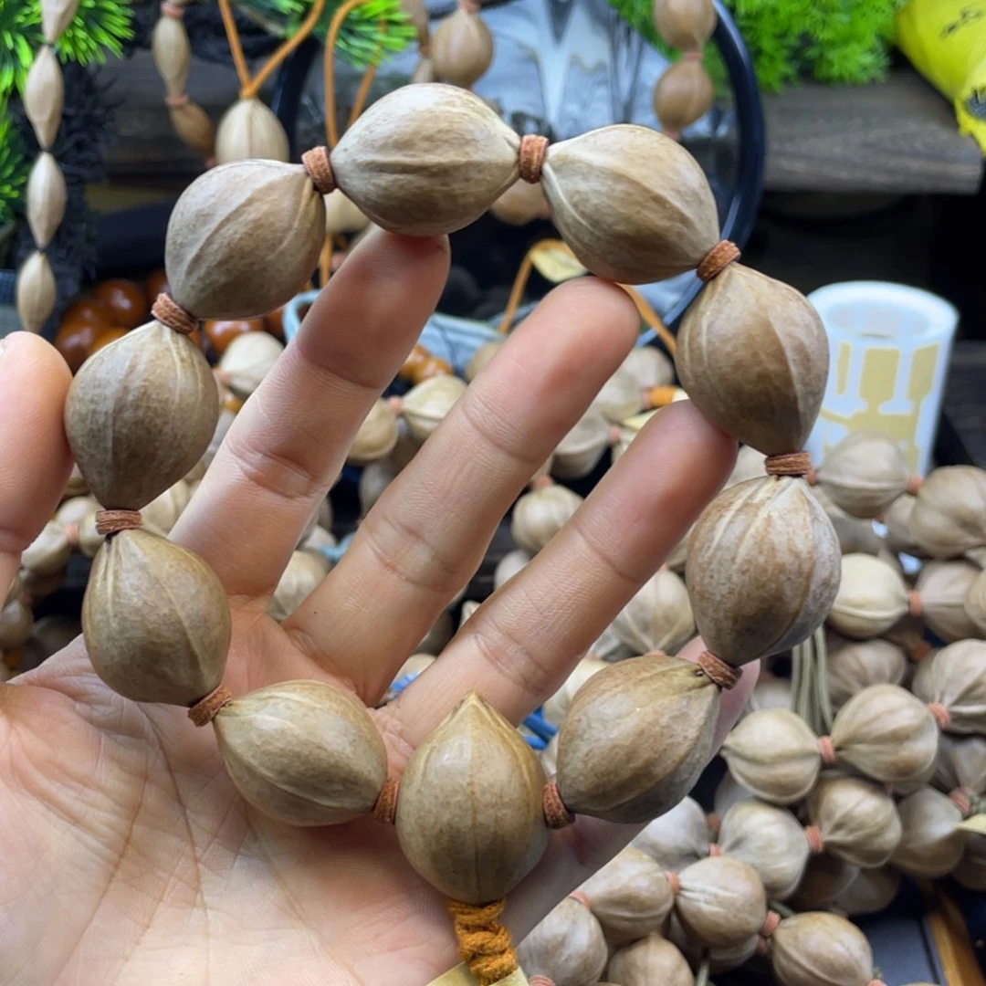 张***宇吊坠橄榄核2129红核