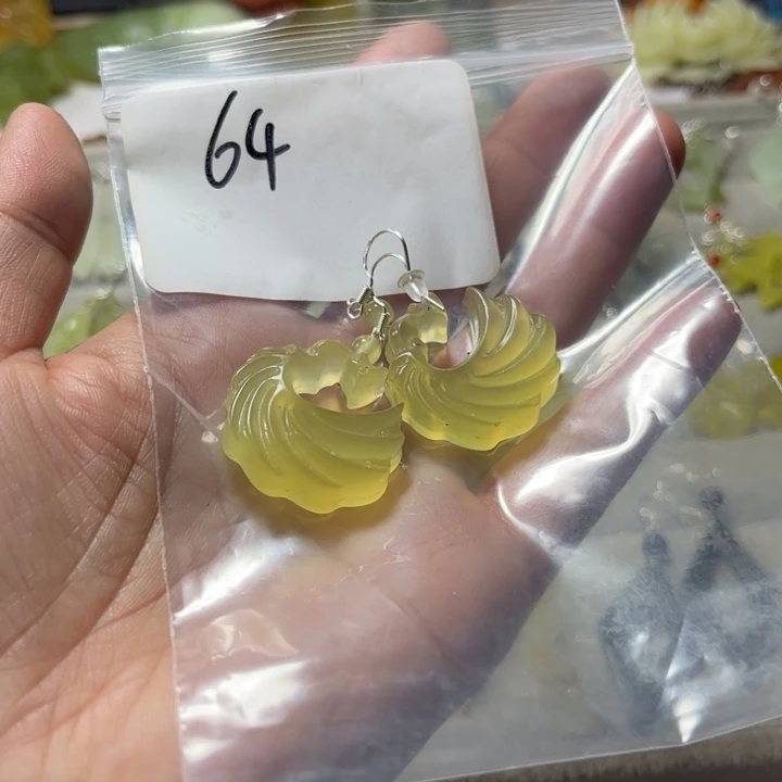 熠***辉蛇纹石玉合金吊坠