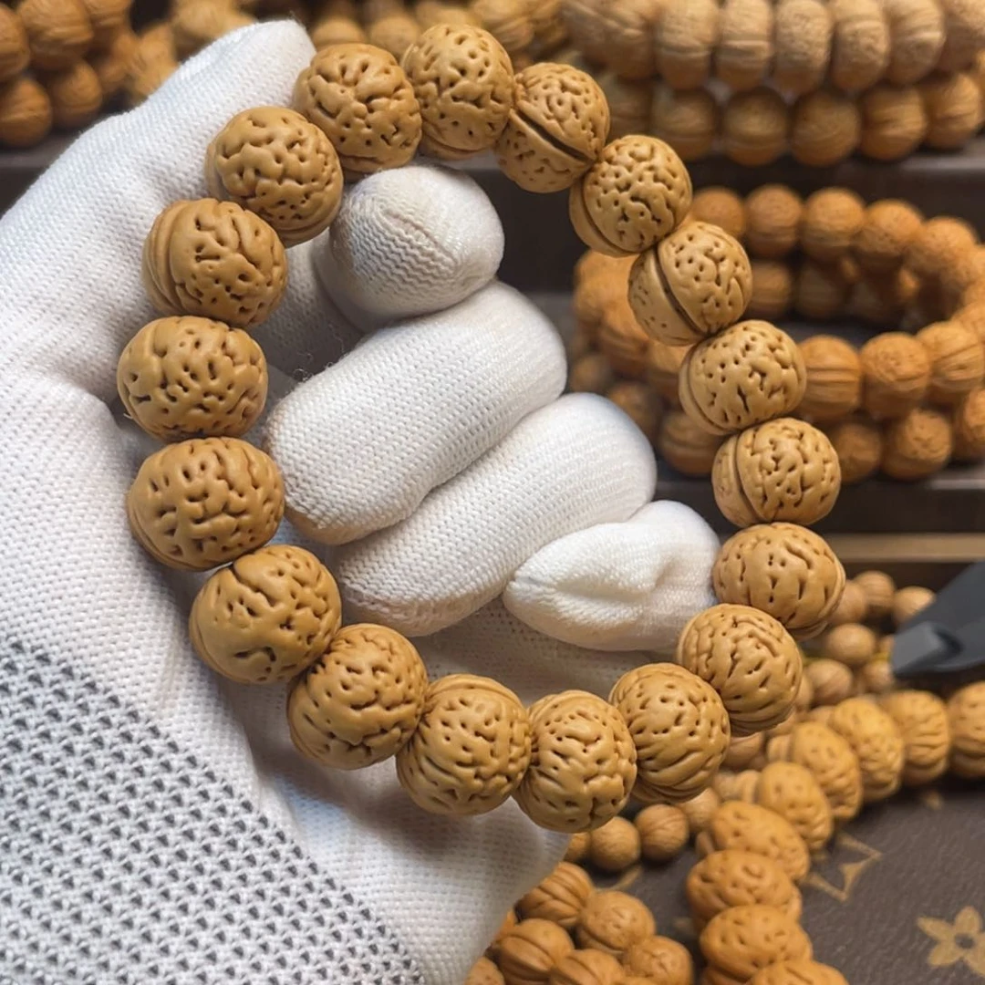 吊坠桃核康**鼻野生肌肉奶豆