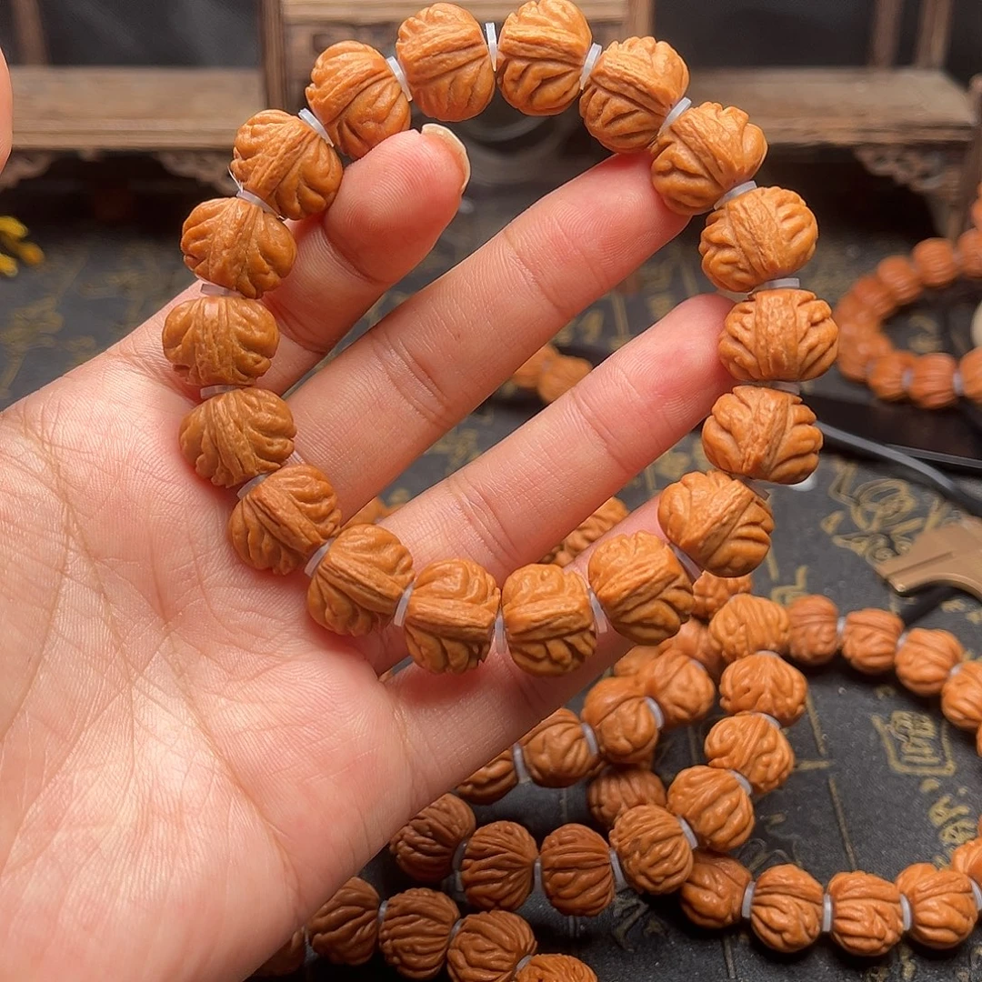 吊坠桃核小金豆手串