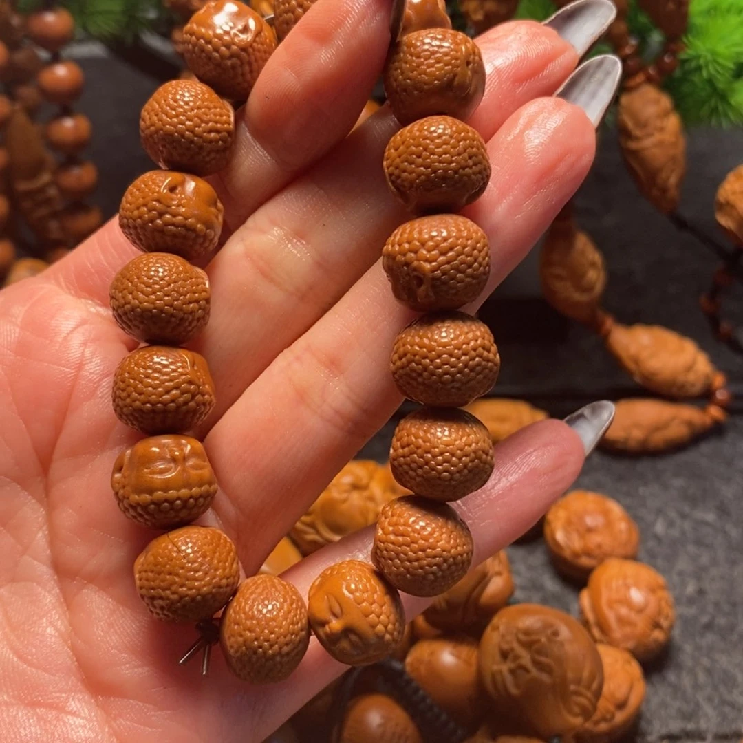 橄榄核吊坠宝宝佛头