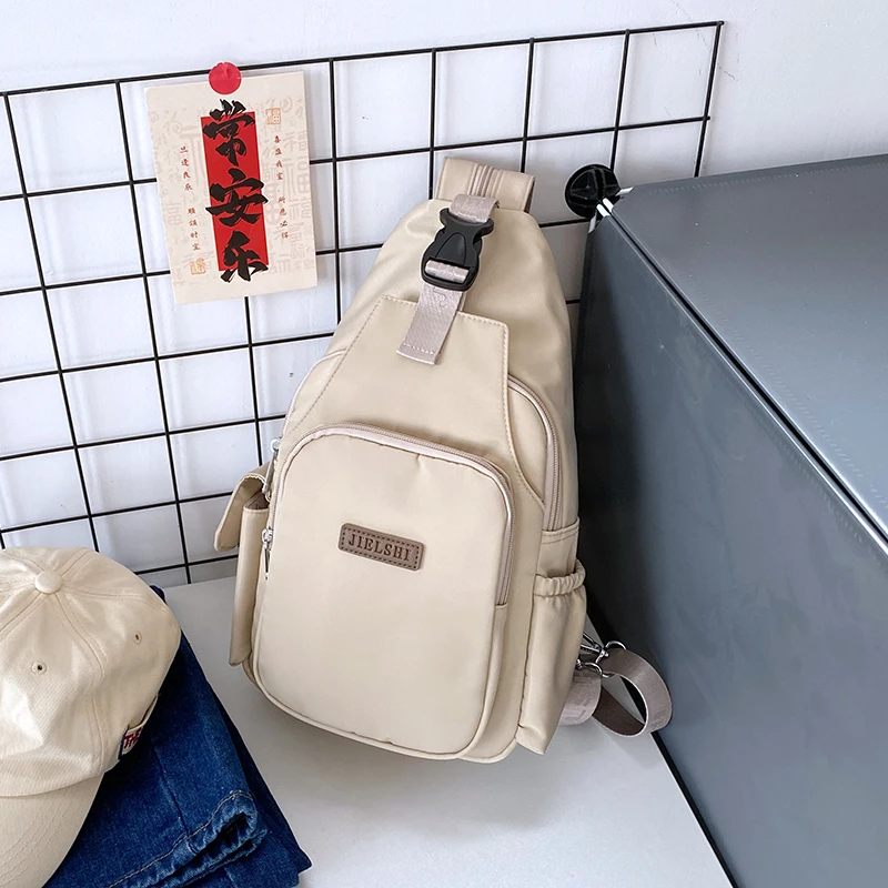 两用胸包女小号旅行背包简约休闲尼龙斜挎包百搭通勤户外牛津布包