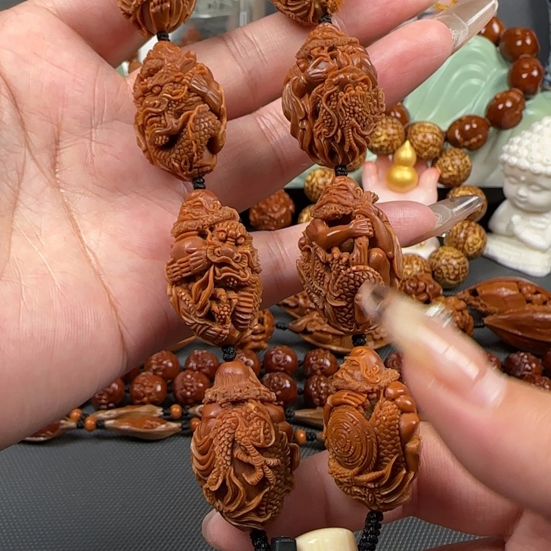 手串/手链橄榄核宽2.1鸡血红水晶核镂空御龙达摩手持