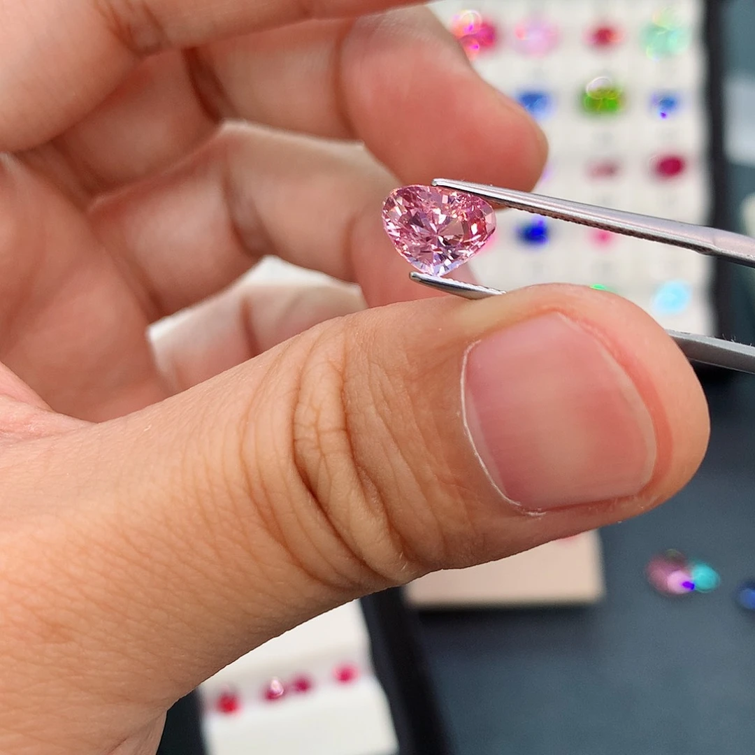 碧玺1.31克拉三角樱花粉未镶嵌