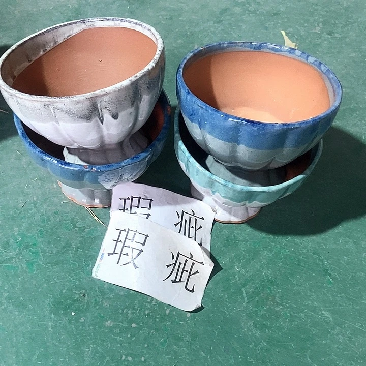 红陶口15。高12。。。。