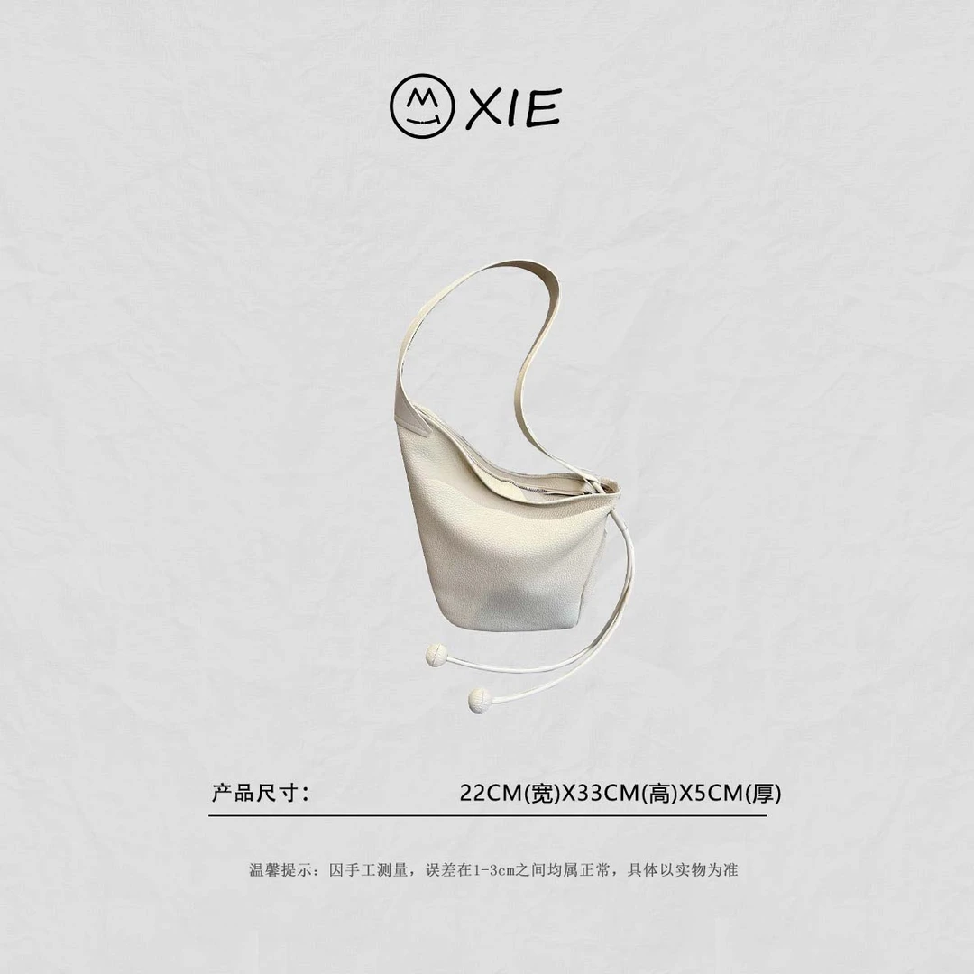 【蟹老板优选】光影共生不规则牛角包女包单肩斜挎包腋下包8089