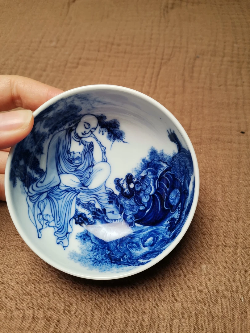 景德镇手绘戏狮罗汉禅定杯