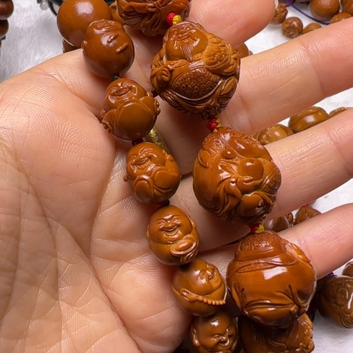 杨***。橄榄核吊坠橄榄核雕刻橄榄核雕