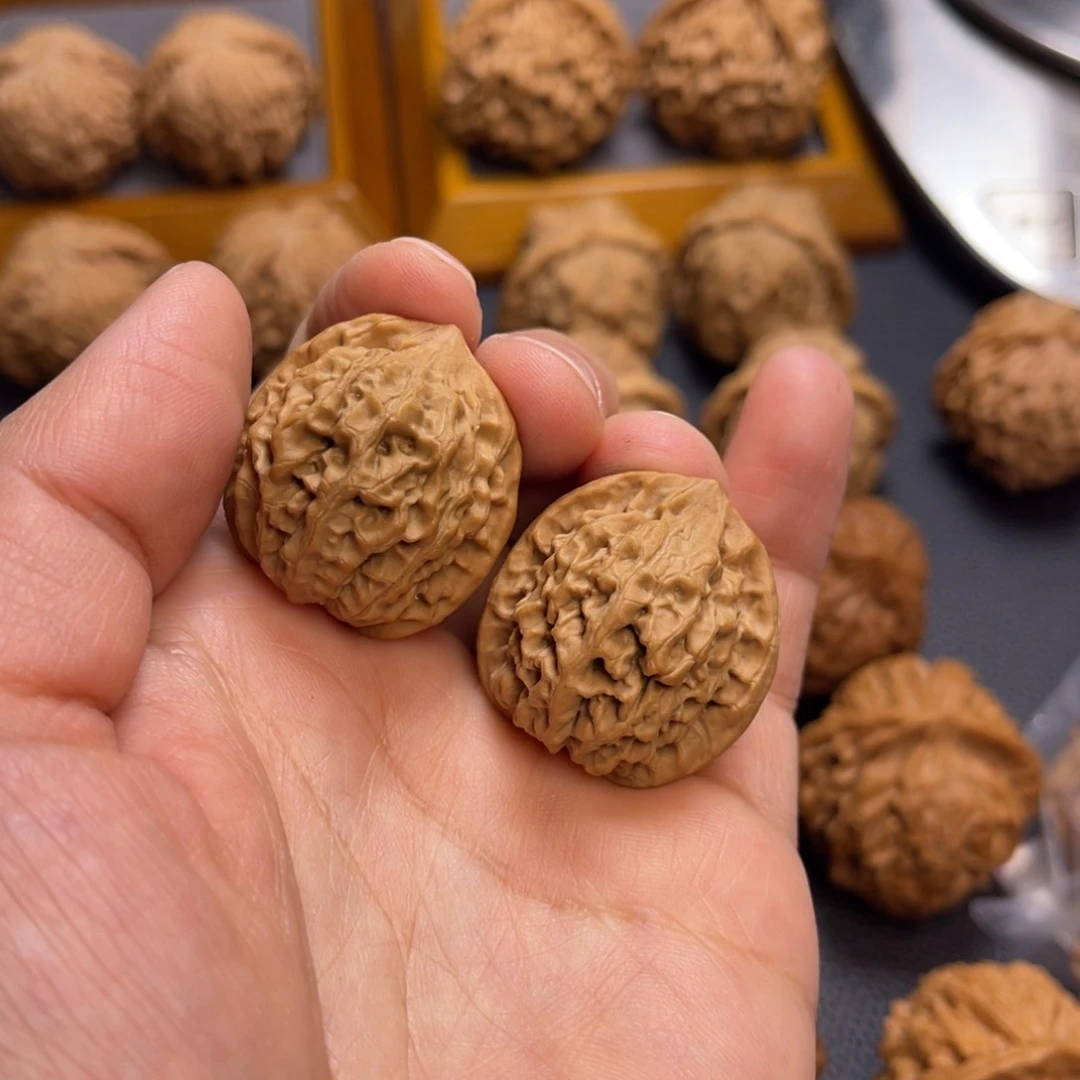 桃核把件28全品秦闷。梦