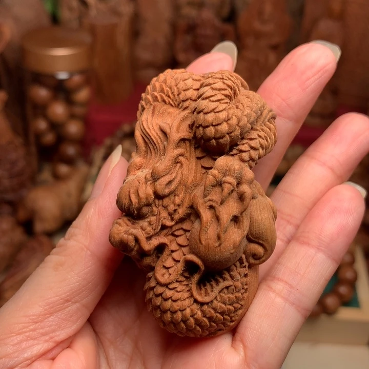檀香木把件老山檀龙手把件微瑕