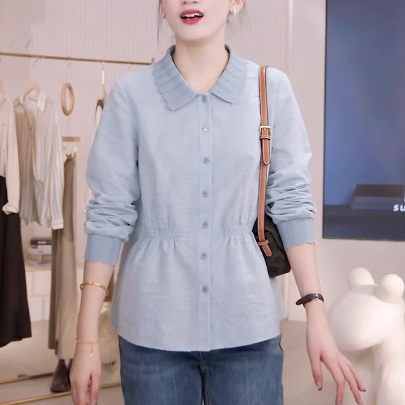 2025秋季新款娃娃领蓝色亚麻衬衫女高级感洋气减龄收腰显瘦上衣