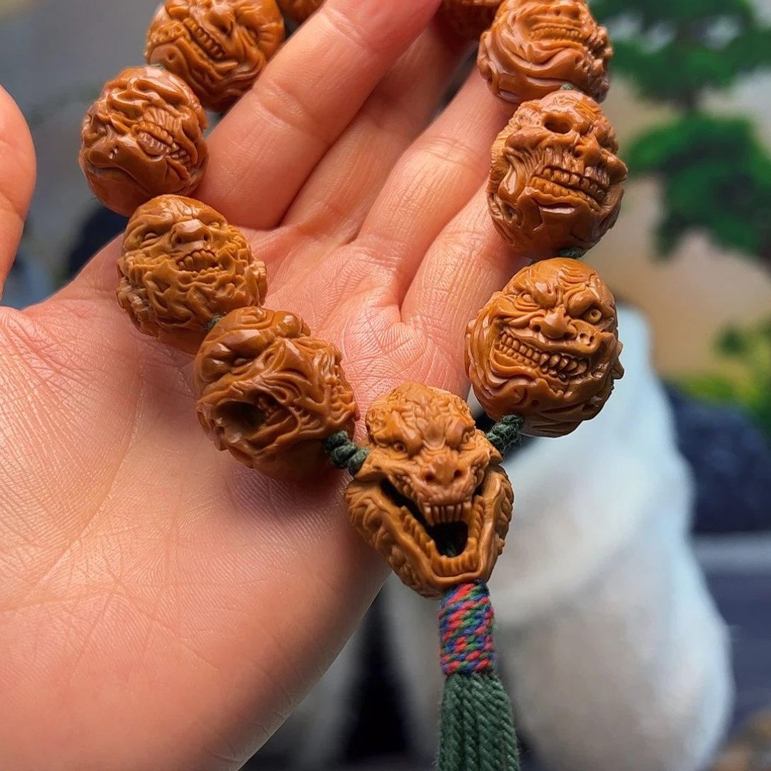 橄榄核手串/手链中**呈橄榄核