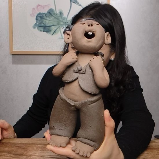 宇***度不规则粗砂羲媧娃系列背篓女娃