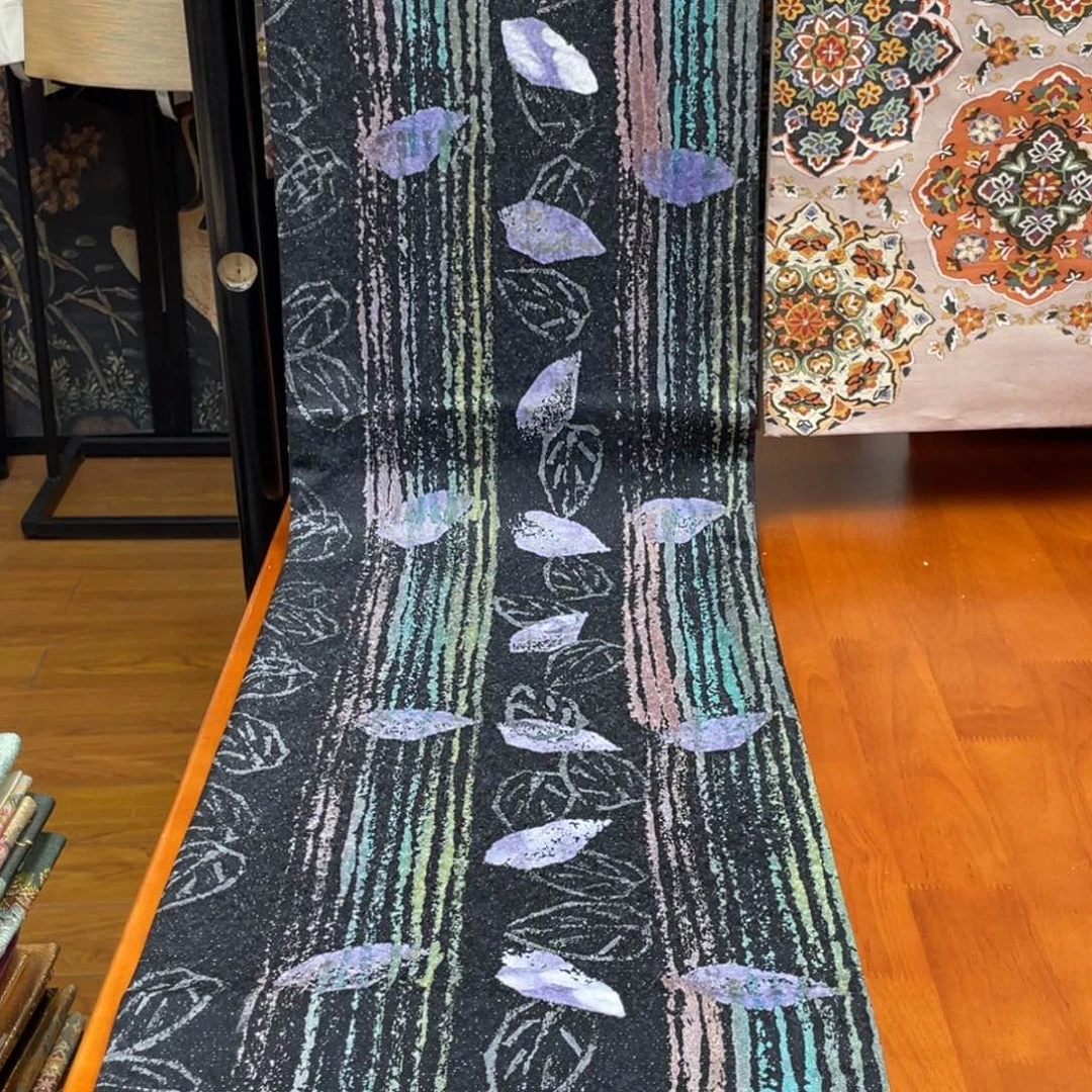 织绣全通唐草织锦