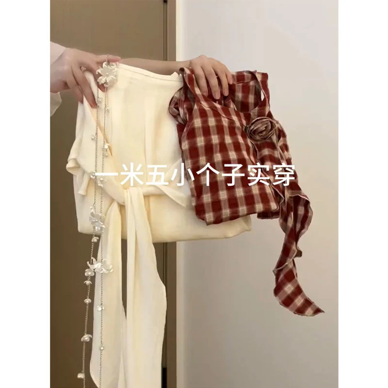 夏季穿搭一整套2025新款洋气无袖挂脖格子上衣绑带半身裙两件套装