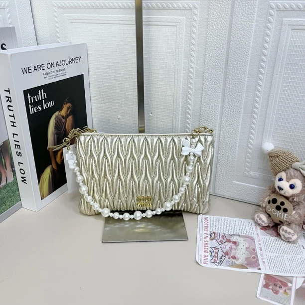 95新 MIU MIU/缪缪 白金褶皱手提挽挎包