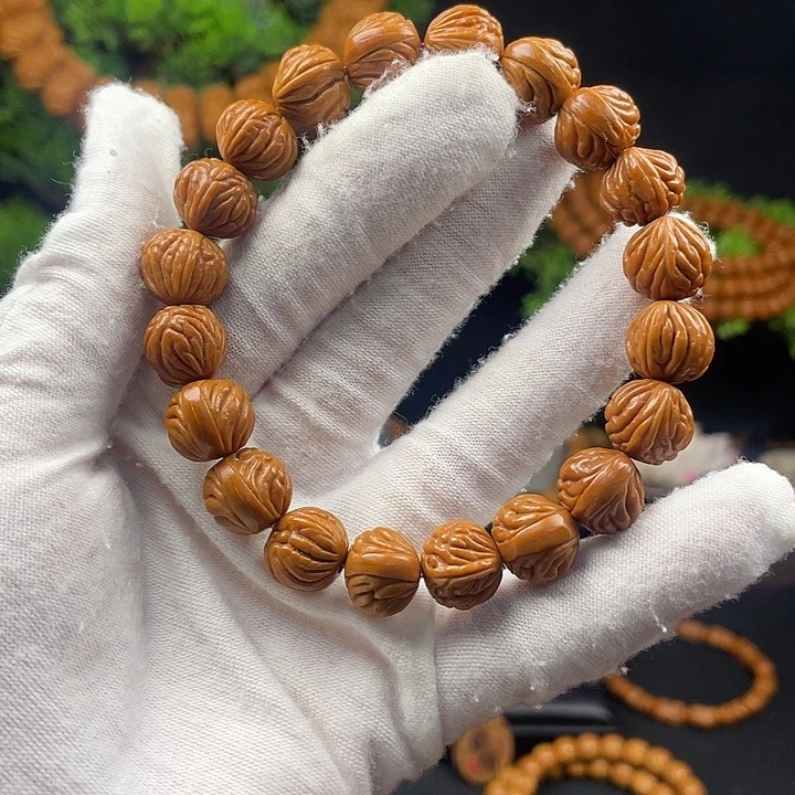 你***吗桃核吊坠秦岭龙纹桃核