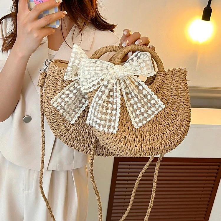斜挎小包包女2025新款蕾丝蝴蝶结手工编织包单肩手提斜挎草编包包