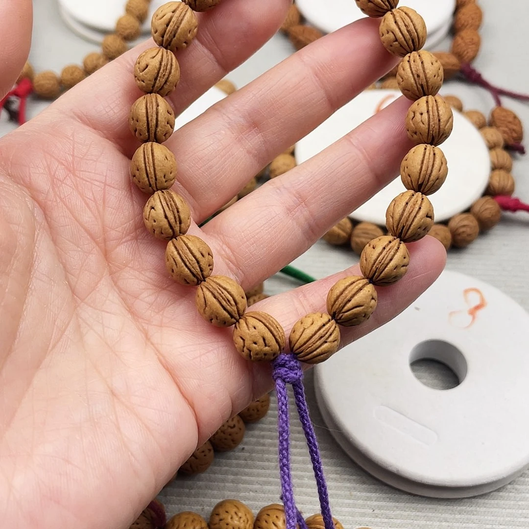 W****10.3尺寸野生桃核手持