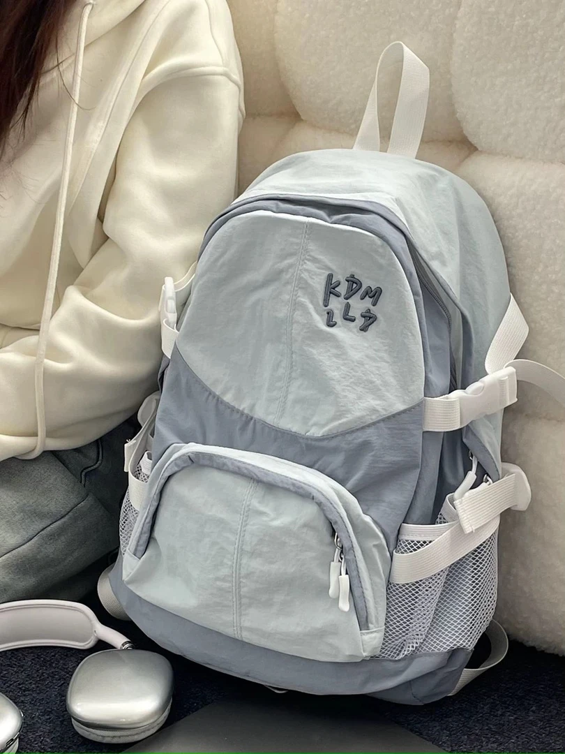 书包女生大学生休闲旅行背包ins新款轻便上班通勤大容量双肩包