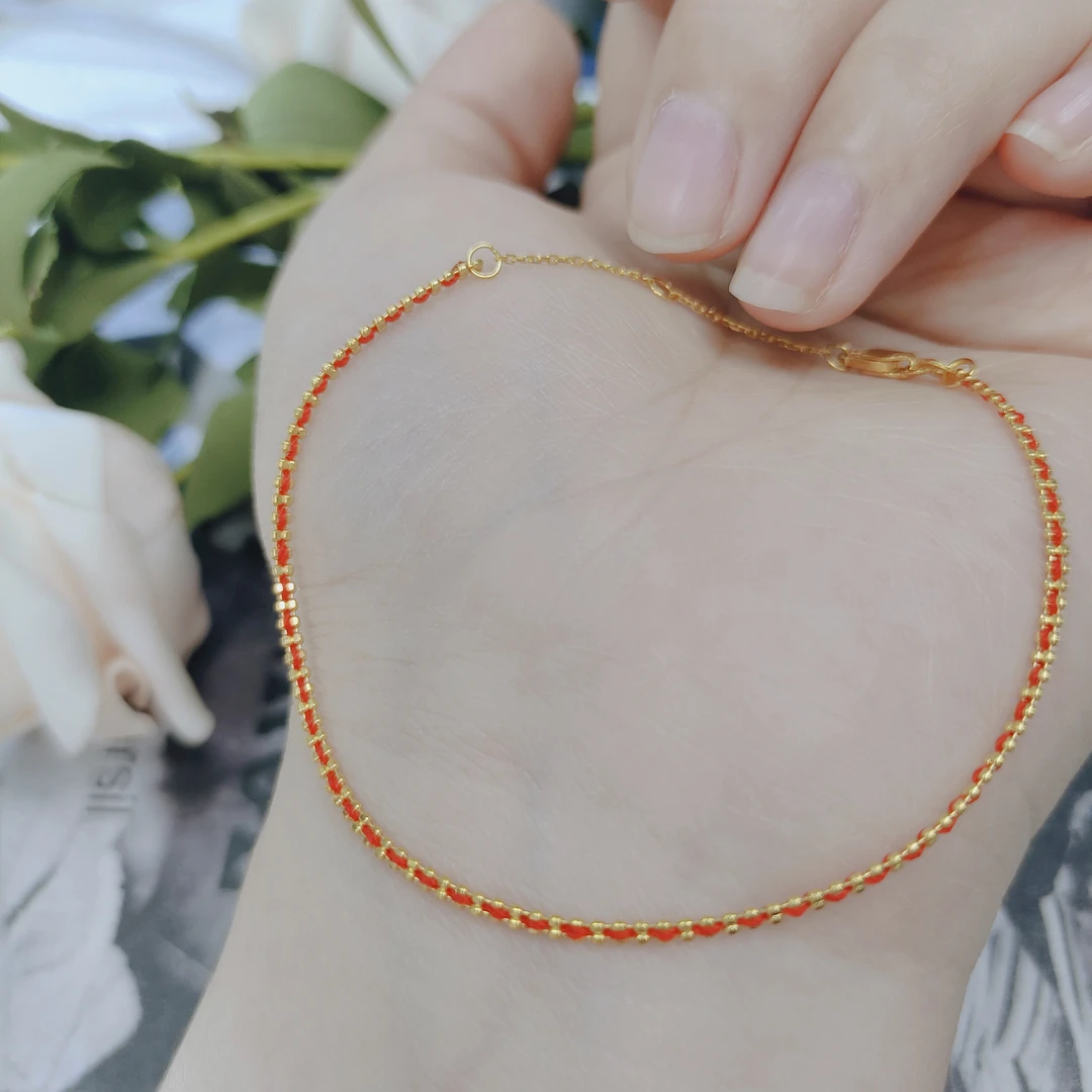 18K黄素金编织红绳手链