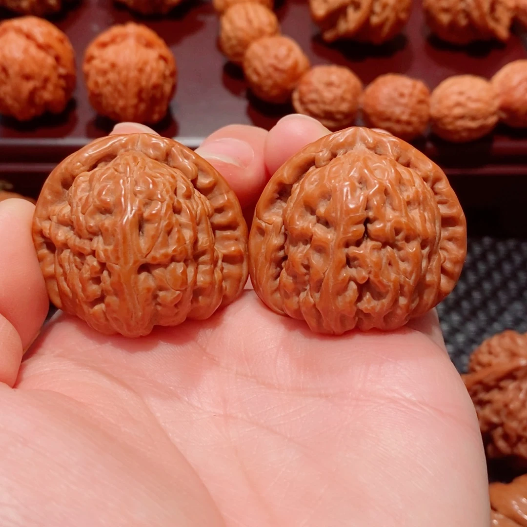 文玩核桃把件心*糸白狮子