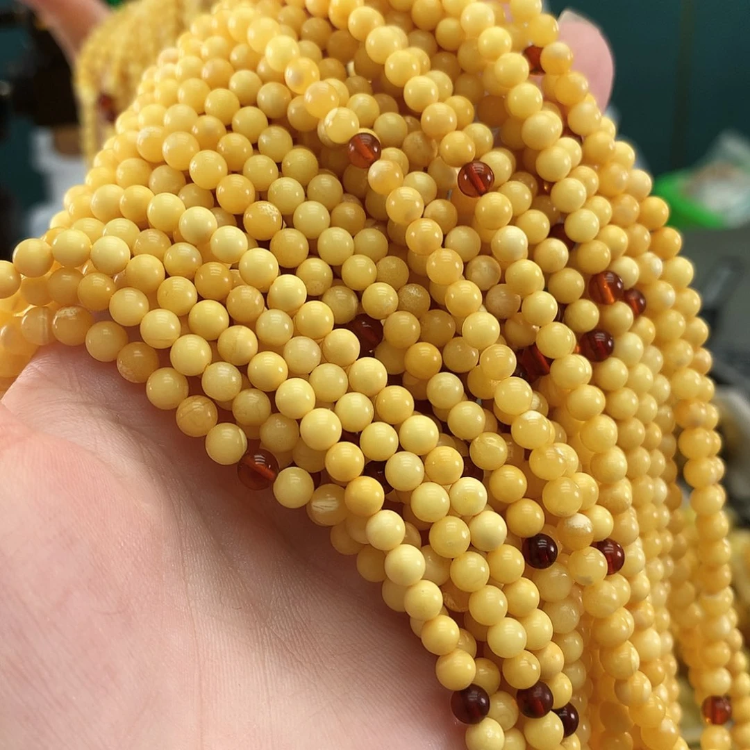 未镶嵌琥珀裸石白花4发一条