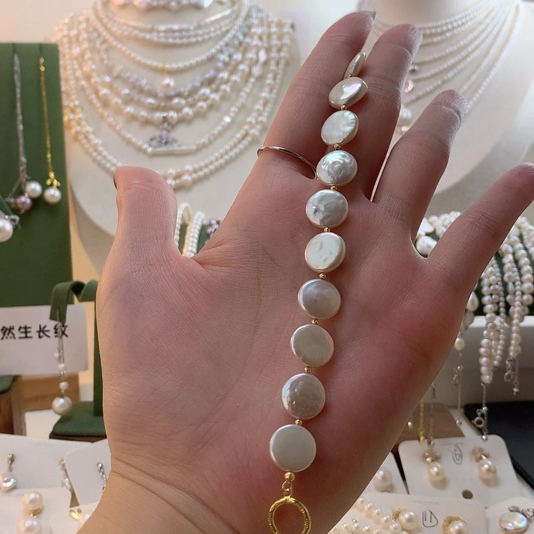 喜***粥手绳银S925镶嵌淡水珍珠纽扣