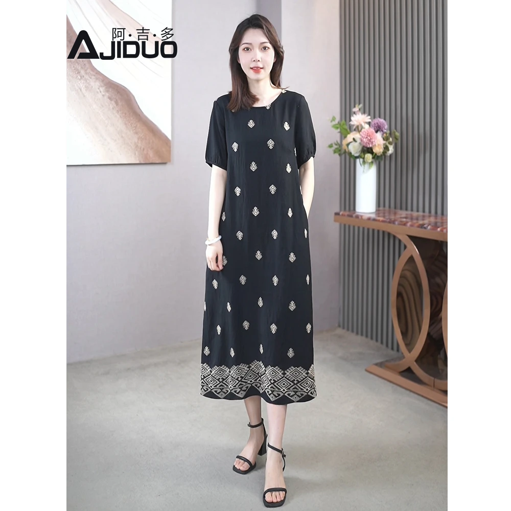 大码优雅气质定位花连衣裙女夏2025新款宽松显瘦重工刺绣中长裙