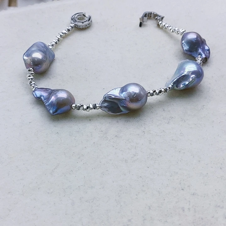 银S925镶嵌淡水珍珠耳饰环****?