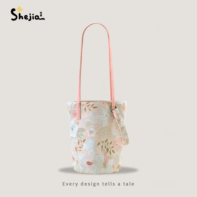 【升级拉链增化妆包】隔江春色春夏新款单肩斜挎拉链水桶包文艺原创