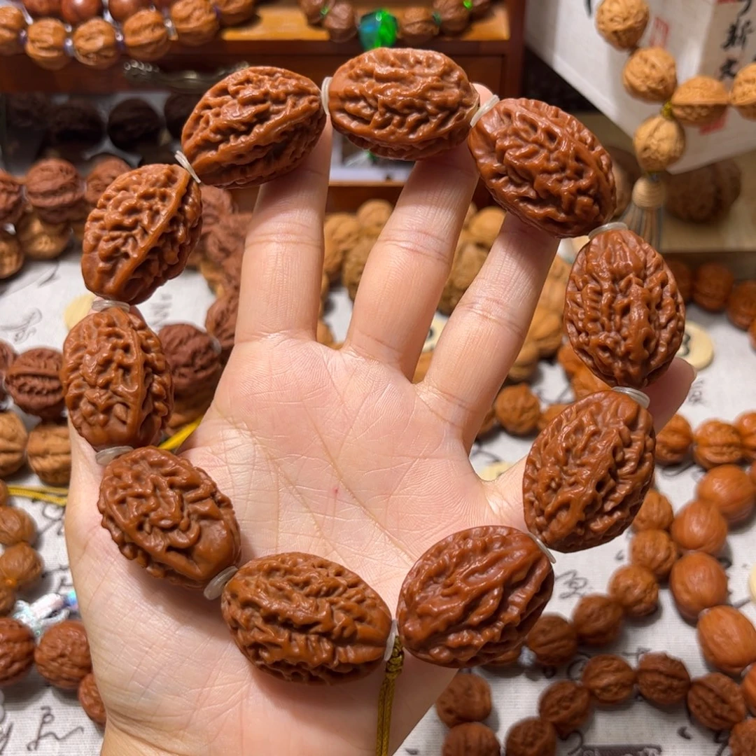 ****哥桃核吊坠鱼骨纹八棱